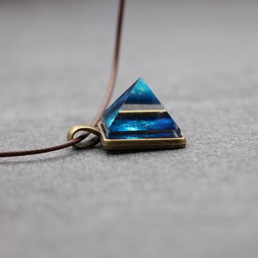 Lyss - Glowing Pyramid Crystal Necklaces